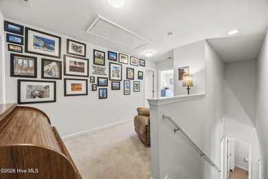 Welcome to 301 Bulkhead Bend, a bright and spacious end-unit in on Carolina Shores Golf Course in North Carolina - for sale on GolfHomes.com, golf home, golf lot