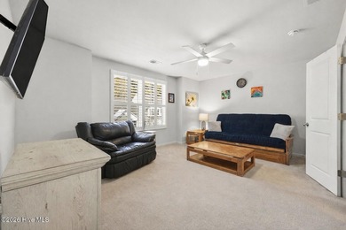 Welcome to 301 Bulkhead Bend, a bright and spacious end-unit in on Carolina Shores Golf Course in North Carolina - for sale on GolfHomes.com, golf home, golf lot