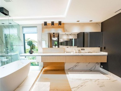 Contemporary House near Miami Beach Golf Club, cosmetic updates on Miami Beach Golf Club in Florida - for sale on GolfHomes.com, golf home, golf lot
