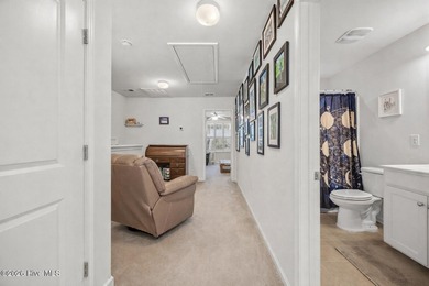 Welcome to 301 Bulkhead Bend, a bright and spacious end-unit in on Carolina Shores Golf Course in North Carolina - for sale on GolfHomes.com, golf home, golf lot