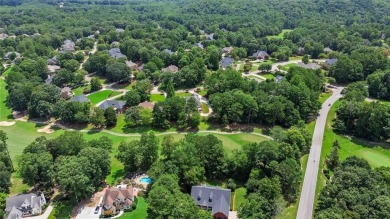 Lovely .68-acre lot perfectly situated at the 11th tee of the on Royal Lakes Golf and Country Club in Georgia - for sale on GolfHomes.com, golf home, golf lot