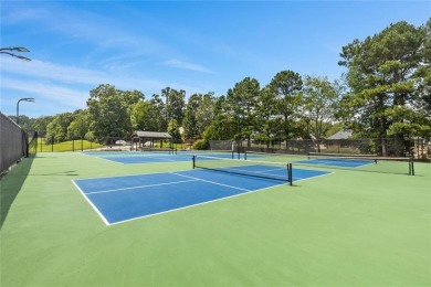 Lovely .68-acre lot perfectly situated at the 11th tee of the on Royal Lakes Golf and Country Club in Georgia - for sale on GolfHomes.com, golf home, golf lot