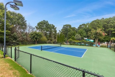 Lovely .68-acre lot perfectly situated at the 11th tee of the on Royal Lakes Golf and Country Club in Georgia - for sale on GolfHomes.com, golf home, golf lot