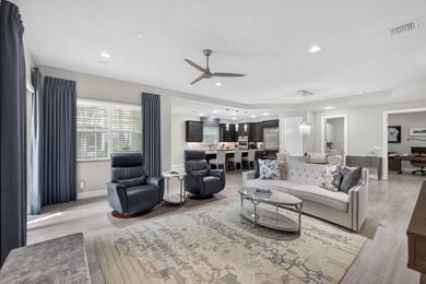 Come see this beautifully upgraded Toll Brothers Pesaro model on Jupiter Country Club in Florida - for sale on GolfHomes.com, golf home, golf lot