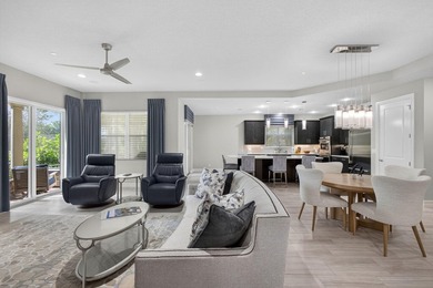 Come see this beautifully upgraded Toll Brothers Pesaro model on Jupiter Country Club in Florida - for sale on GolfHomes.com, golf home, golf lot