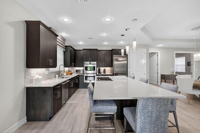 Come see this beautifully upgraded Toll Brothers Pesaro model on Jupiter Country Club in Florida - for sale on GolfHomes.com, golf home, golf lot