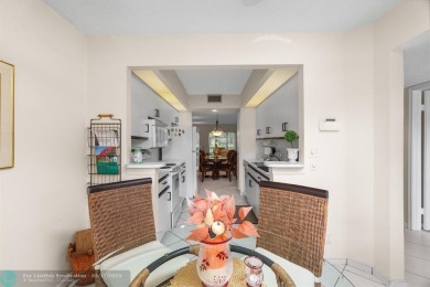 Fully furnished TURNKEY unit with full sized washer and dryer on Wynmoor Golf Course in Florida - for sale on GolfHomes.com, golf home, golf lot