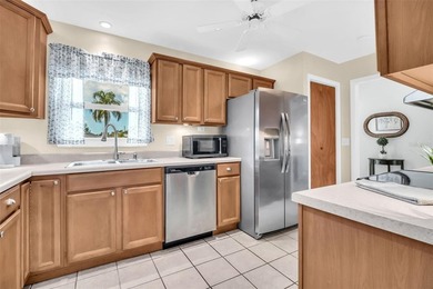 Beautifully updated and RARE 3-bedroom, 2-bath home with an on Highland Lakes Executive Golf Course in Florida - for sale on GolfHomes.com, golf home, golf lot