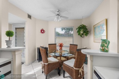 Fully furnished TURNKEY unit with full sized washer and dryer on Wynmoor Golf Course in Florida - for sale on GolfHomes.com, golf home, golf lot