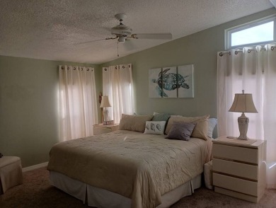The Lot Rent for this home is $1,342.00/monthly.  Priced to sell on Del Tura Golf and Country Club in Florida - for sale on GolfHomes.com, golf home, golf lot