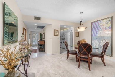 Fully furnished TURNKEY unit with full sized washer and dryer on Wynmoor Golf Course in Florida - for sale on GolfHomes.com, golf home, golf lot