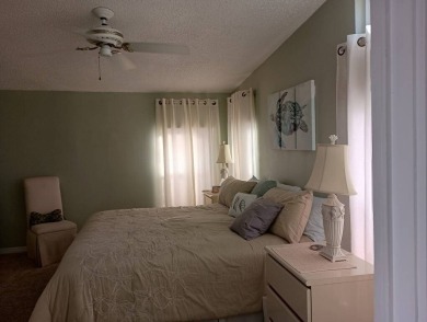 The Lot Rent for this home is $1,342.00/monthly.  Priced to sell on Del Tura Golf and Country Club in Florida - for sale on GolfHomes.com, golf home, golf lot