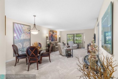 Fully furnished TURNKEY unit with full sized washer and dryer on Wynmoor Golf Course in Florida - for sale on GolfHomes.com, golf home, golf lot