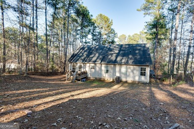 Welcome home to this charming 3-bedroom, 2-bath ranch located in on Turtle Cove Golf Course in Georgia - for sale on GolfHomes.com, golf home, golf lot