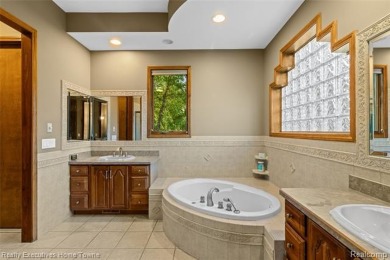 Located on one of Golfside's most desirable lots, this custom R on St Clair River Country Club in Michigan - for sale on GolfHomes.com, golf home, golf lot