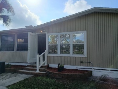 The Lot Rent for this home is $1,342.00/monthly.  Priced to sell on Del Tura Golf and Country Club in Florida - for sale on GolfHomes.com, golf home, golf lot