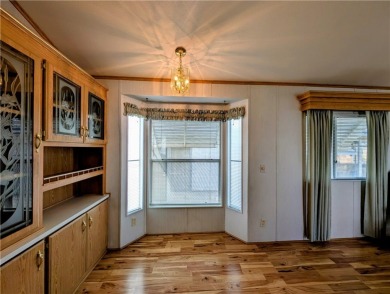 This home is immaculate. Well maintained. Fabulous front deck on Riverview Golf Course in Arizona - for sale on GolfHomes.com, golf home, golf lot