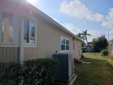 The Lot Rent for this home is $1,342.00/monthly.  Priced to sell on Del Tura Golf and Country Club in Florida - for sale on GolfHomes.com, golf home, golf lot