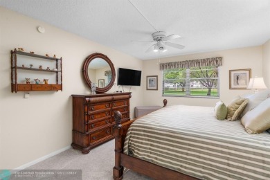 Fully furnished TURNKEY unit with full sized washer and dryer on Wynmoor Golf Course in Florida - for sale on GolfHomes.com, golf home, golf lot