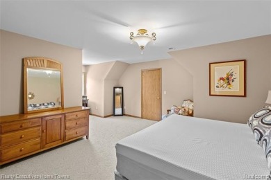 Located on one of Golfside's most desirable lots, this custom R on St Clair River Country Club in Michigan - for sale on GolfHomes.com, golf home, golf lot