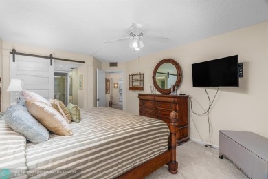 Fully furnished TURNKEY unit with full sized washer and dryer on Wynmoor Golf Course in Florida - for sale on GolfHomes.com, golf home, golf lot