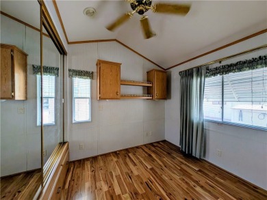 This home is immaculate. Well maintained. Fabulous front deck on Riverview Golf Course in Arizona - for sale on GolfHomes.com, golf home, golf lot