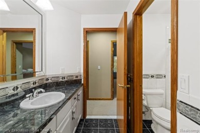 Located on one of Golfside's most desirable lots, this custom R on St Clair River Country Club in Michigan - for sale on GolfHomes.com, golf home, golf lot