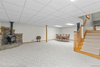 Located on one of Golfside's most desirable lots, this custom R on St Clair River Country Club in Michigan - for sale on GolfHomes.com, golf home, golf lot