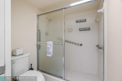 Fully furnished TURNKEY unit with full sized washer and dryer on Wynmoor Golf Course in Florida - for sale on GolfHomes.com, golf home, golf lot