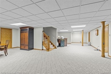 Located on one of Golfside's most desirable lots, this custom R on St Clair River Country Club in Michigan - for sale on GolfHomes.com, golf home, golf lot