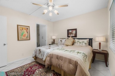 Fully furnished TURNKEY unit with full sized washer and dryer on Wynmoor Golf Course in Florida - for sale on GolfHomes.com, golf home, golf lot