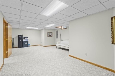 Located on one of Golfside's most desirable lots, this custom R on St Clair River Country Club in Michigan - for sale on GolfHomes.com, golf home, golf lot