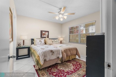Fully furnished TURNKEY unit with full sized washer and dryer on Wynmoor Golf Course in Florida - for sale on GolfHomes.com, golf home, golf lot