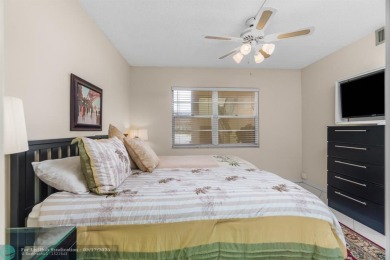Fully furnished TURNKEY unit with full sized washer and dryer on Wynmoor Golf Course in Florida - for sale on GolfHomes.com, golf home, golf lot