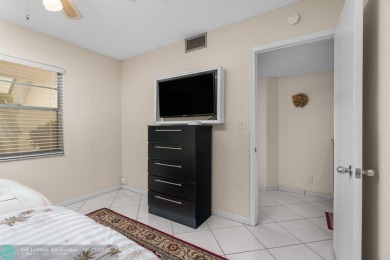 Fully furnished TURNKEY unit with full sized washer and dryer on Wynmoor Golf Course in Florida - for sale on GolfHomes.com, golf home, golf lot