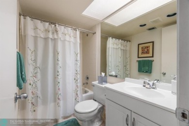 Fully furnished TURNKEY unit with full sized washer and dryer on Wynmoor Golf Course in Florida - for sale on GolfHomes.com, golf home, golf lot