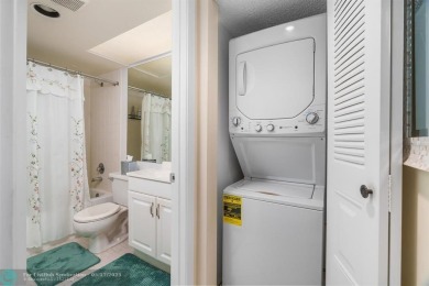 Fully furnished TURNKEY unit with full sized washer and dryer on Wynmoor Golf Course in Florida - for sale on GolfHomes.com, golf home, golf lot