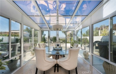 Discover one of the best-gated residences in Los Angeles! on Virginia Country Club in California - for sale on GolfHomes.com, golf home, golf lot