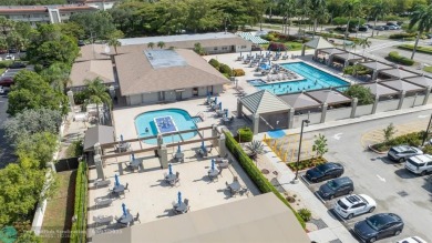 Fully furnished TURNKEY unit with full sized washer and dryer on Wynmoor Golf Course in Florida - for sale on GolfHomes.com, golf home, golf lot