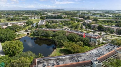 Fully furnished TURNKEY unit with full sized washer and dryer on Wynmoor Golf Course in Florida - for sale on GolfHomes.com, golf home, golf lot