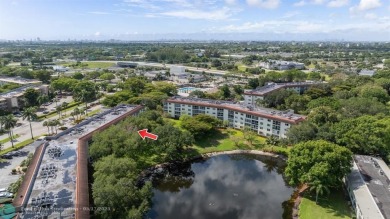 Fully furnished TURNKEY unit with full sized washer and dryer on Wynmoor Golf Course in Florida - for sale on GolfHomes.com, golf home, golf lot