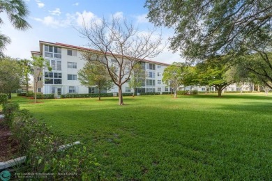 Fully furnished TURNKEY unit with full sized washer and dryer on Wynmoor Golf Course in Florida - for sale on GolfHomes.com, golf home, golf lot