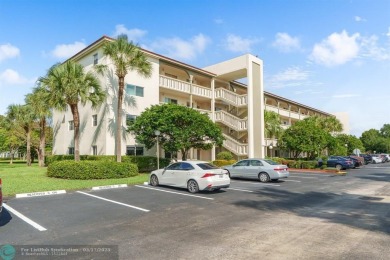 Fully furnished TURNKEY unit with full sized washer and dryer on Wynmoor Golf Course in Florida - for sale on GolfHomes.com, golf home, golf lot