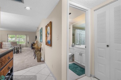 Fully furnished TURNKEY unit with full sized washer and dryer on Wynmoor Golf Course in Florida - for sale on GolfHomes.com, golf home, golf lot