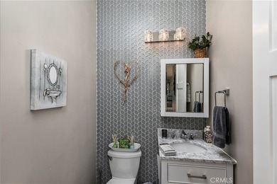 Elevated to capture breathtaking panoramic views of city lights on Bear Creek Golf and Country Club in California - for sale on GolfHomes.com, golf home, golf lot