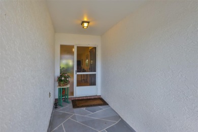 Welcome to this cozy and well-maintained Sunrise II model on Falcon Watch Golf Club in Florida - for sale on GolfHomes.com, golf home, golf lot