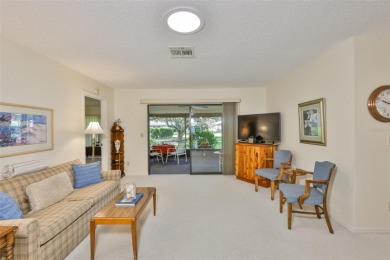 Welcome to this cozy and well-maintained Sunrise II model on Falcon Watch Golf Club in Florida - for sale on GolfHomes.com, golf home, golf lot