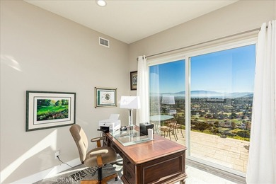 Elevated to capture breathtaking panoramic views of city lights on Bear Creek Golf and Country Club in California - for sale on GolfHomes.com, golf home, golf lot