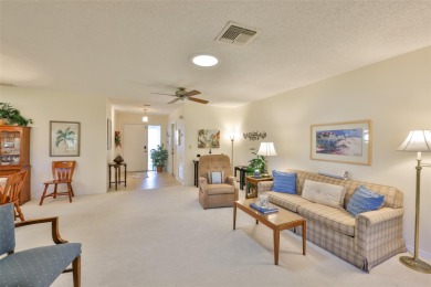 Welcome to this cozy and well-maintained Sunrise II model on Falcon Watch Golf Club in Florida - for sale on GolfHomes.com, golf home, golf lot