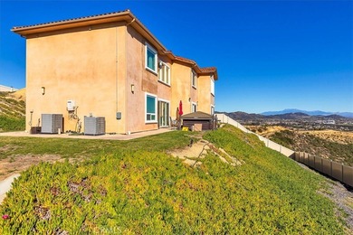 Elevated to capture breathtaking panoramic views of city lights on Bear Creek Golf and Country Club in California - for sale on GolfHomes.com, golf home, golf lot